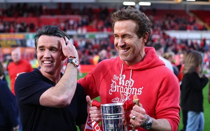 Hollywood stars Ryan Reynolds and Rob McElhenney celebrate Wrexham promotion