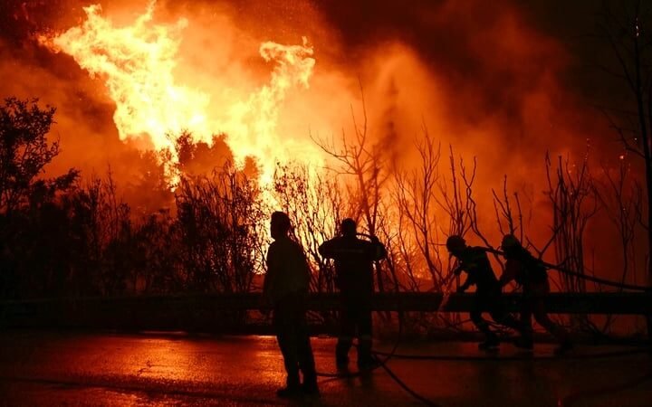 Wildfires fanned by heatwave rage across Europe