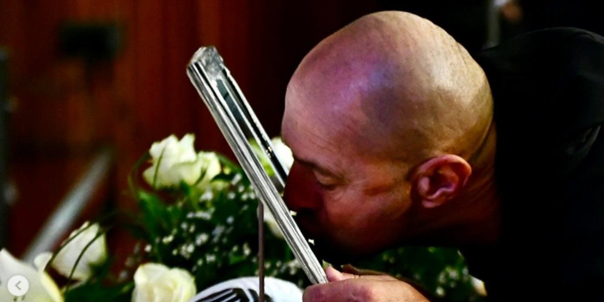 Football community pays tribute at memorial for Serbian manager who died mid-match