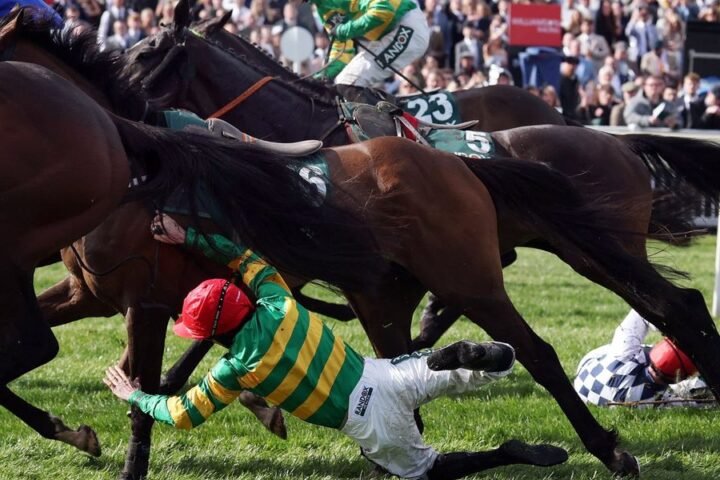 Jockey Robbie Dunne taken to hospital after serious fall at Grand National